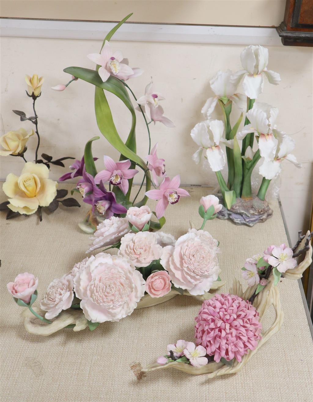 Three Boehm flower groups - no.85 Chrysanthemum and Blossom, Pink Peony centrepiece and Iris silver shower, and a Cymbidium Orchid